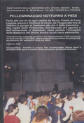 Retro del documentario sul pellegrinaggio notturno a piedi