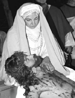 Gesù fra le braccia di sua Madre Maria